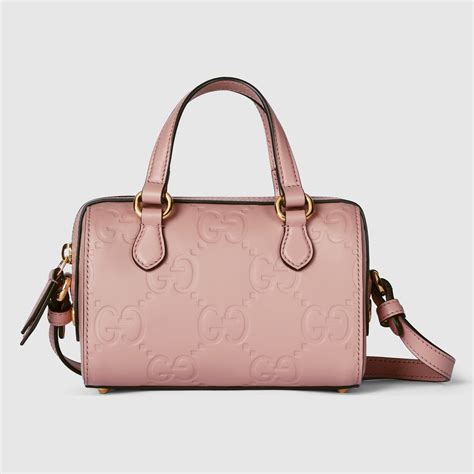 GG super mini top handle bag in rose beige leather.